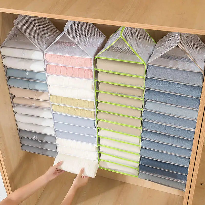 Hanging wardrobe organiser with folded clothes inside a wardrobe