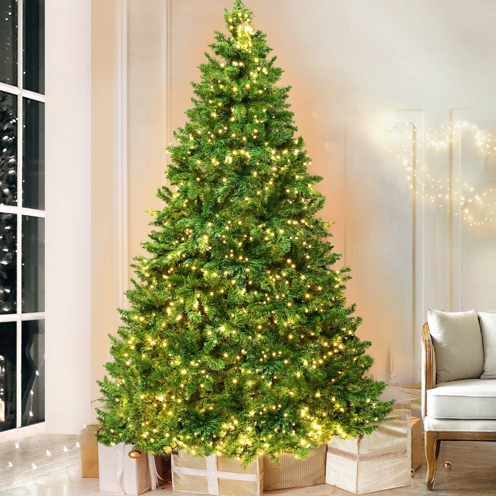 2.1m pre-lit Christmas tree with warm white LEDs in a living room